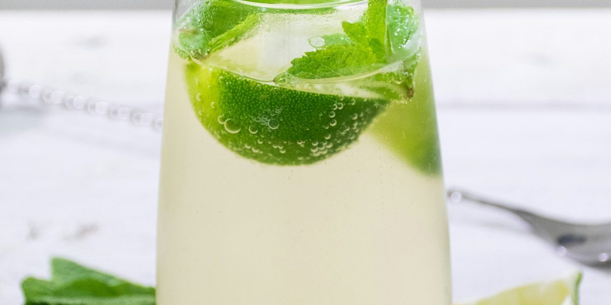 Cup of Chinese green tea with loose leaves