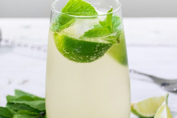 Cup of Chinese green tea with loose leaves